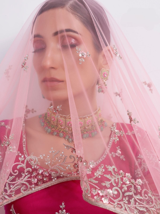 Shaded Pink Sequins Embroidered Net Wedding Wear Lehenga Choli